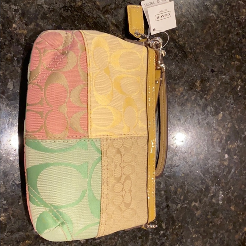 Coach patchwork clutch brand new